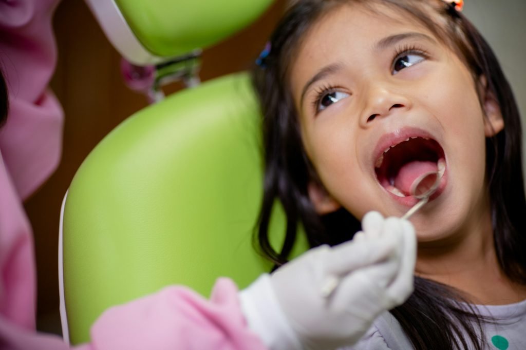 Little Asian girls teeth are healthy in the Dental office. Dental care, Dentist care.